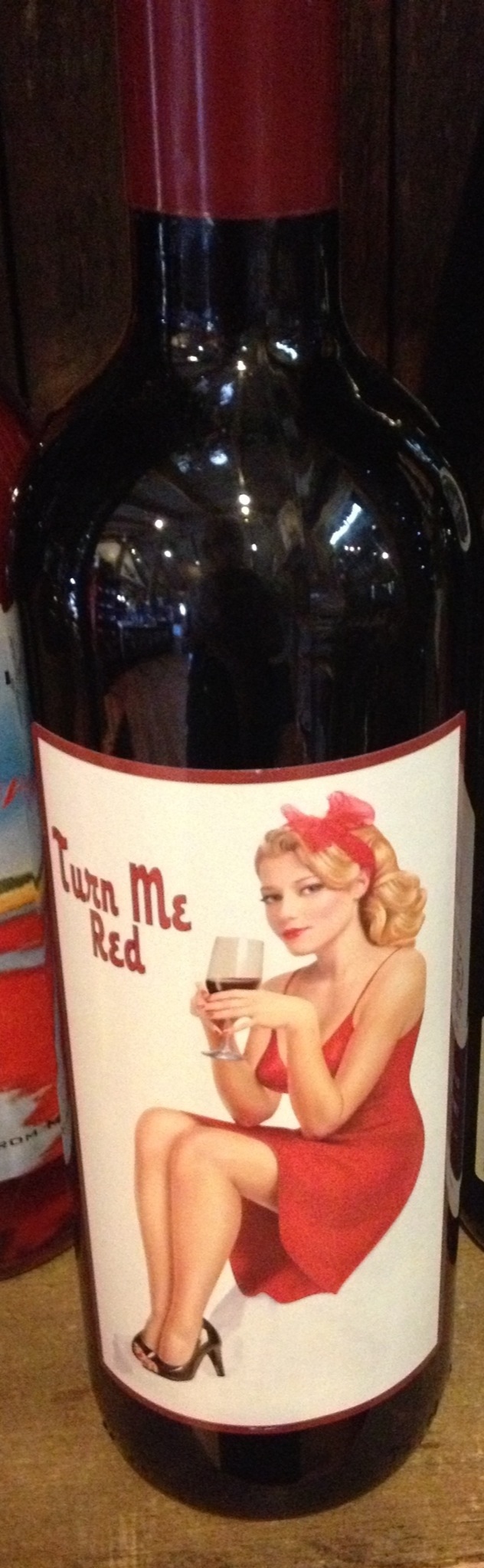 Wine bottle with pinup on it-Turn Me Red. 