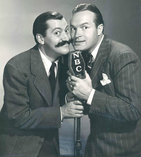 Jerry Colonna and Bob Hope-1940s vintage image. Jerry is wearing a mustache. 