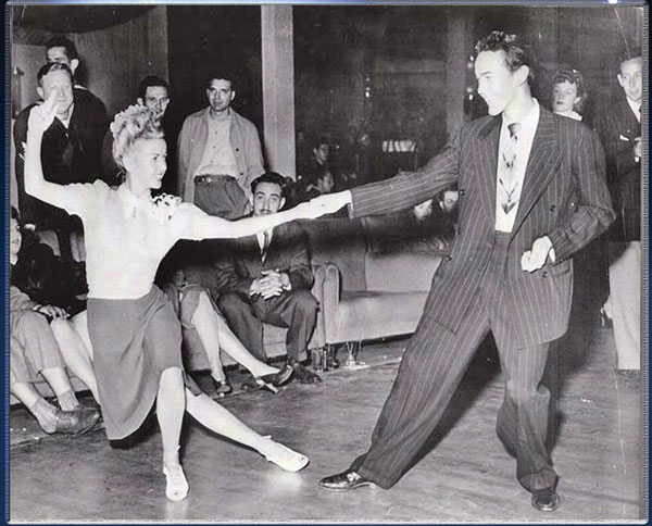 Jean Veloz 1940s vintage swing dancer / 1940s lindy hopper dancing with her brother in 1940s fashions. 