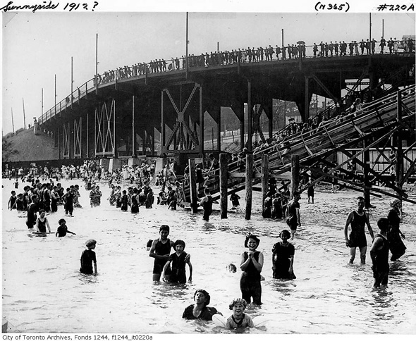 1912 Sunnyside Beach vintage photo of bathers in the water in Toronto, Ontario, Canada. 