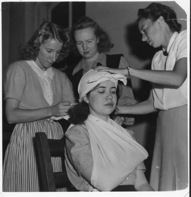 1940s vintage image of women doing first ad at their nursing college. 