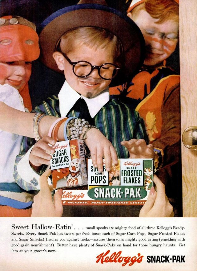 1950s vintage ad: kelloggs snack pak cereal halloween ad-1955 featuring kids in Halloween costumes trick or treating. 